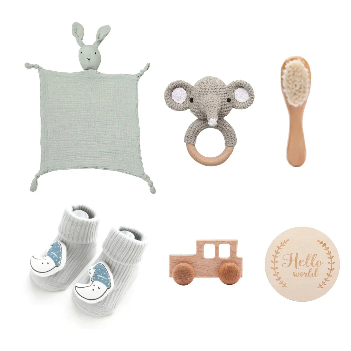 Babycadeauset in neutrale kleuren met houten accessoires en textiel olifant
