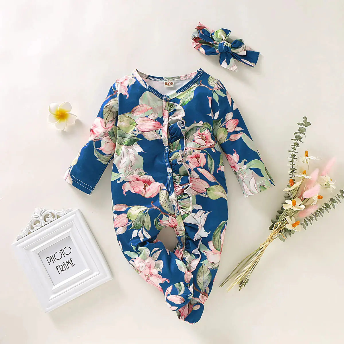 bloemenprint baby jumpsuit met lange mouwen. Zacht, comfortabel en ideaal voor dagelijks gebruik. Voor baby’s van 3m tot 2 jaar.