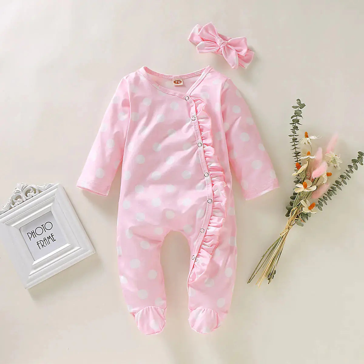 bloemenprint baby jumpsuit roze. Zacht, comfortabel en ideaal voor dagelijks gebruik. Voor baby’s van 3m tot 2 jaar.
