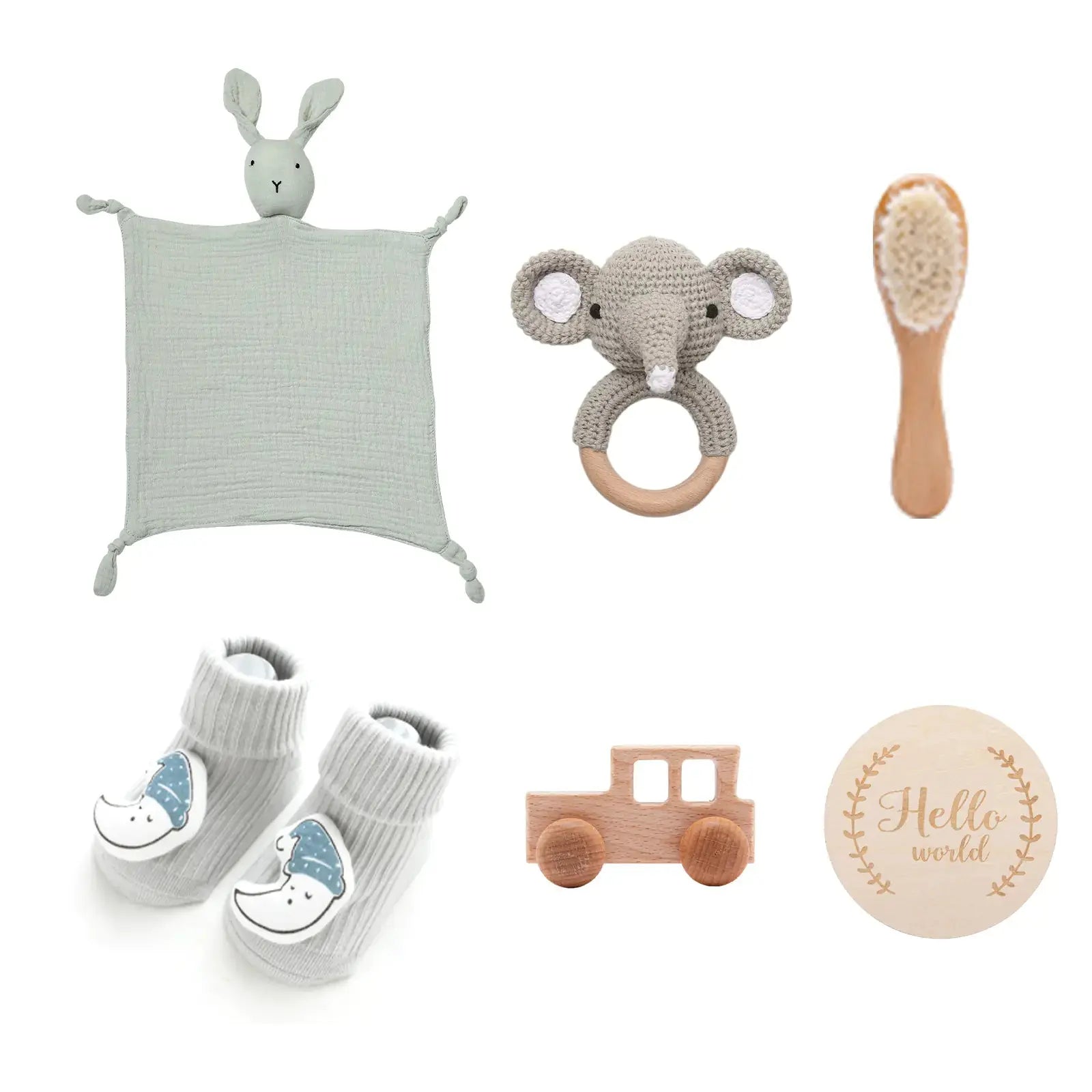 Babycadeauset in neutrale kleuren met houten accessoires en textiel olifant